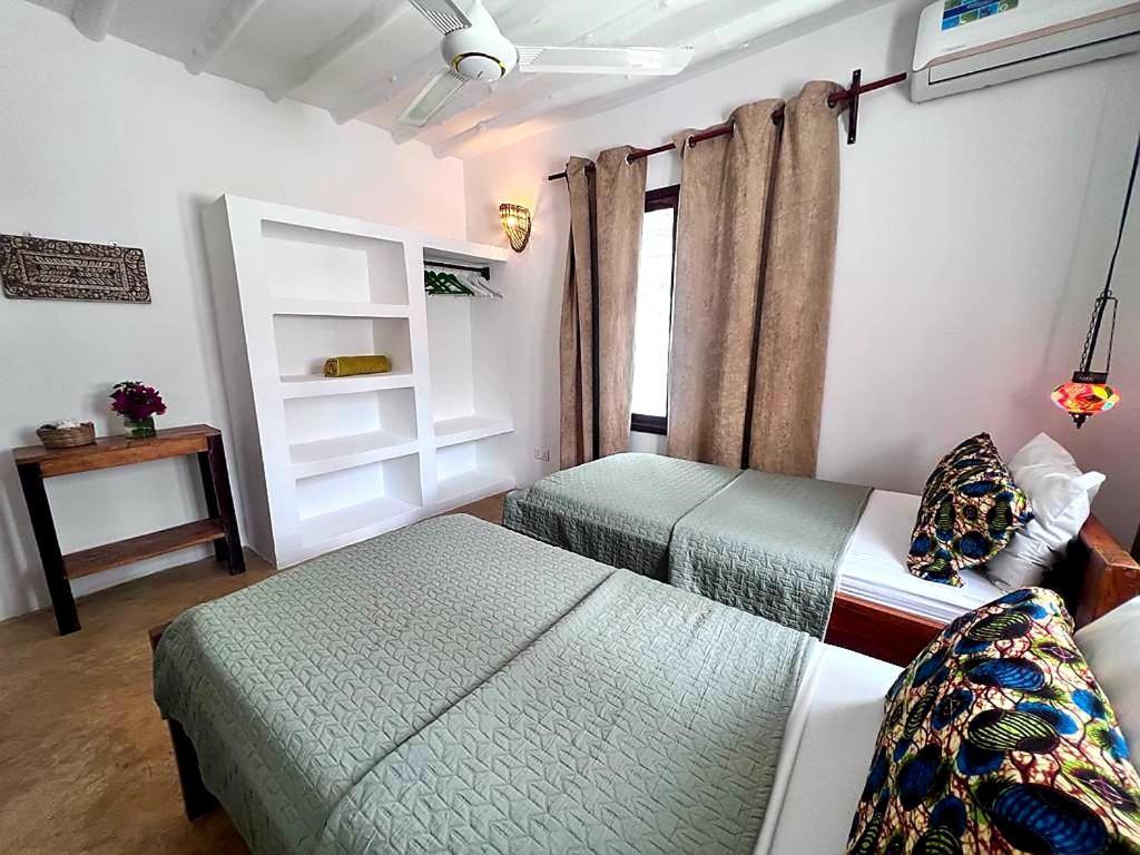 Moyo Apartment Pwani Mchangani Eksteriør bilde